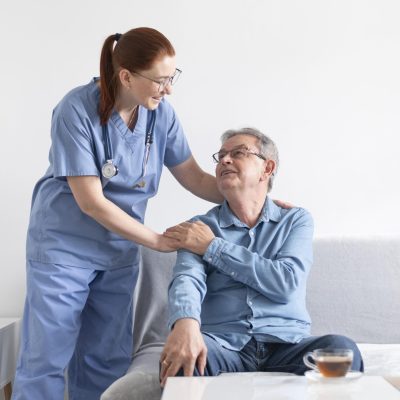 medium-shot-smiley-man-nurse